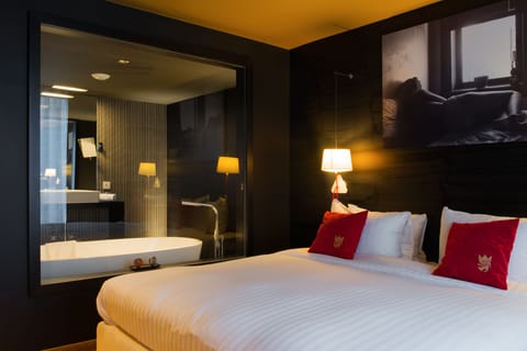 Premium bedding, down comforters, minibar, in-room safe