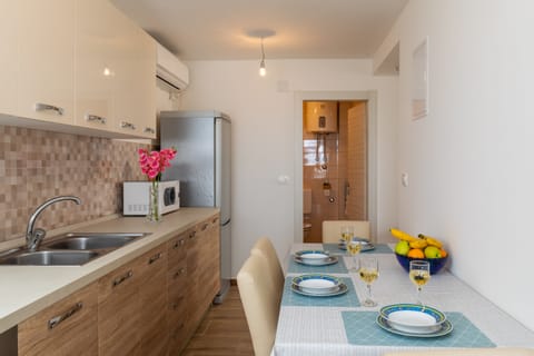 Apartment (Two-Bedroom Apartment with Terrace) | Private kitchen | Fridge