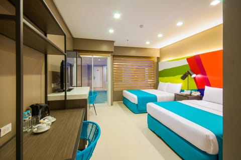 Deluxe Room, Pool Access | Minibar, in-room safe, desk, laptop workspace