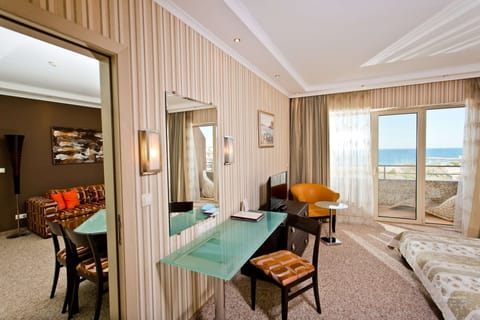 Family Apartment, Sea View | Minibar, in-room safe, desk, laptop workspace