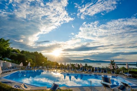 Outdoor pool, pool umbrellas, sun loungers