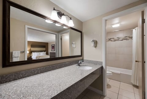 Standard Room, 2 Queen Beds, Non Smoking | Bathroom | Combined shower/tub, hair dryer, towels