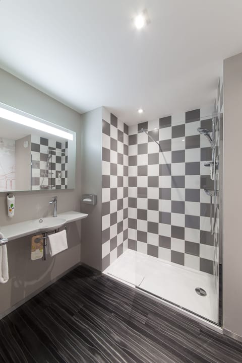 Shower, eco-friendly toiletries, hair dryer, towels