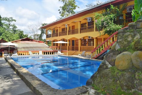 Outdoor pool, pool umbrellas, sun loungers