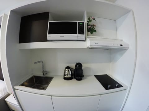 Triple Room | Private kitchenette | Coffee/tea maker, electric kettle