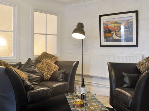 Welcoming living area | The Calving Shed, Near Neilston