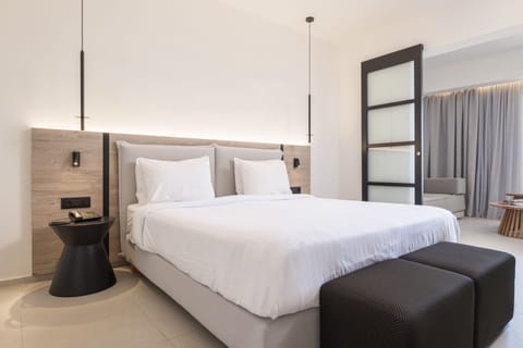 Suite, 1 Bedroom, Sea View | Minibar, blackout drapes, soundproofing, iron/ironing board