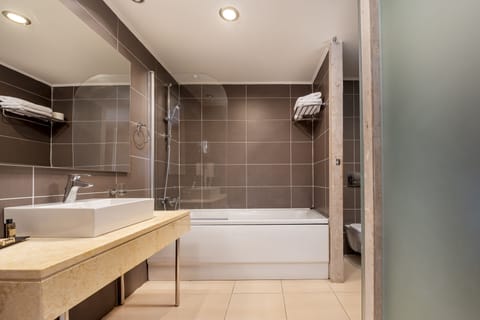 Suite, 1 Bedroom | Bathroom | Bathtub, deep soaking tub, free toiletries, hair dryer
