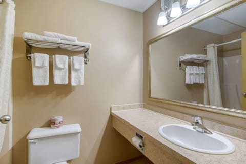 Standard Room, 2 Queen Beds, Non Smoking | Bathroom | Combined shower/tub, hair dryer, towels