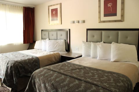 Standard Room, 2 Double Beds (Newly remodeled bathrooms) | Desk, laptop workspace, free WiFi, bed sheets