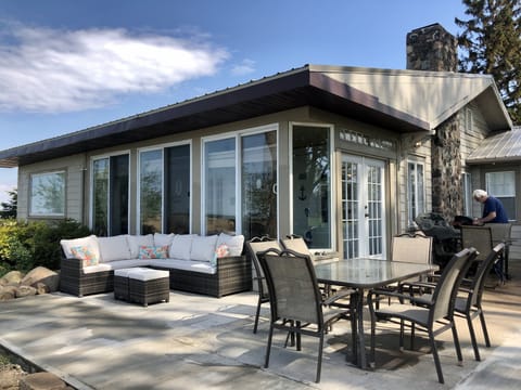 Lakefront dining (two tables that seat 6 and the other 4 = 10)