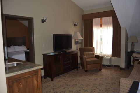 Suite, 1 Bedroom | Desk, blackout drapes, iron/ironing board, free cribs/infant beds