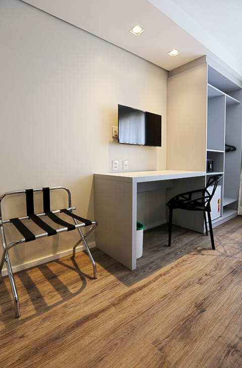 Superior Room | Minibar, in-room safe, desk, laptop workspace