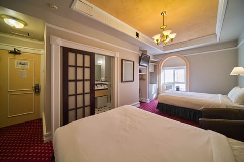 Deluxe Double Room, 2 Queen Beds, Courtyard View | Premium bedding, desk, laptop workspace, blackout drapes