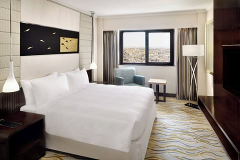 Egyptian cotton sheets, premium bedding, minibar, in-room safe