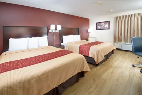 Deluxe Room, 2 Queen Beds, Smoke Free | Iron/ironing board, free cribs/infant beds, free WiFi, bed sheets