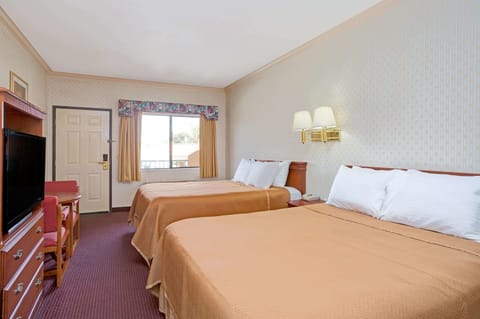 Standard Room, 2 Queen Beds | In-room safe, iron/ironing board, free cribs/infant beds, free WiFi