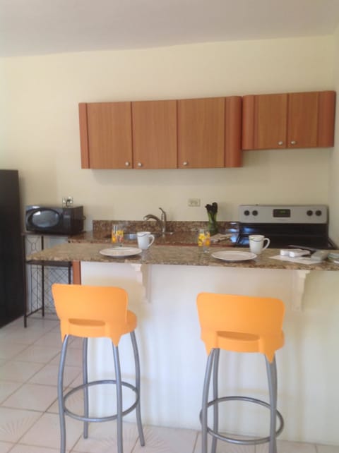 Two Bedroom Condo Standard | Private kitchen | Full-size fridge, microwave, stovetop, coffee/tea maker