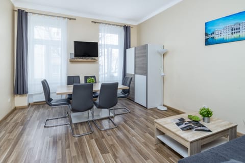 Standard Apartment, 2 Bedrooms | Living area | Flat-screen TV, DVD player