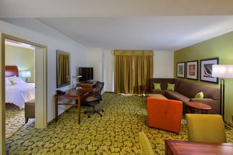 Junior Suite, 1 King Bed | Living area | 42-inch flat-screen TV with cable channels, TV