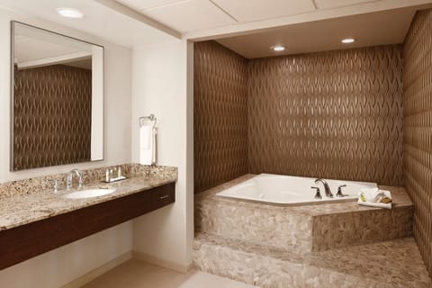 Presidential Suite, 1 King Bed | Bathroom | Combined shower/tub, eco-friendly toiletries, hair dryer, towels