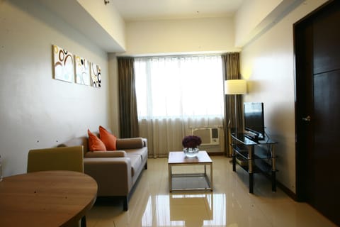 Suite, 1 Bedroom | Living area | 32-inch LED TV with cable channels, TV