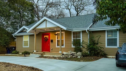 Well lit front yard with off street parking. 