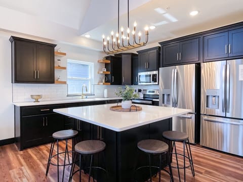 Main level kitchen with sufficient counter/prep space and double refrigerators