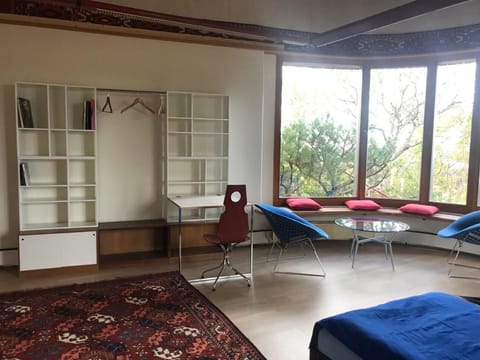 Desk and sitting area with a view