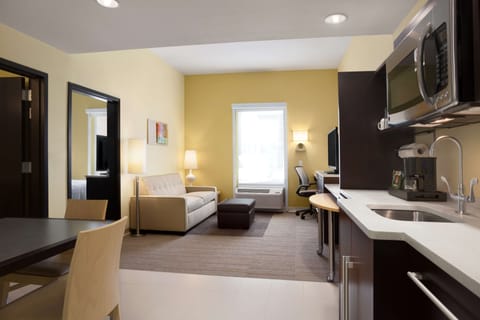 Suite, 1 King Bed | Living area | LCD TV, MP3 dock