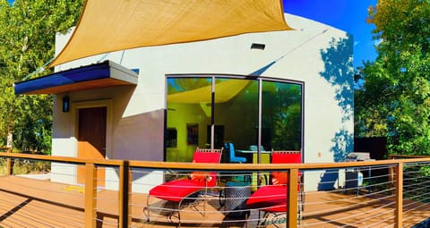 Front of home. Huge deck on the river. Private, relaxing and modern. 