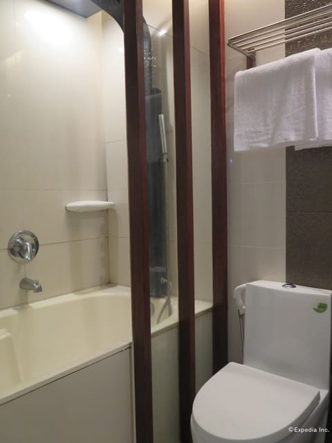 Studio Suite | Bathroom | Hair dryer, slippers, bidet, towels