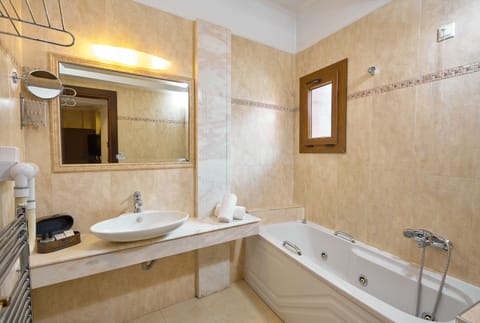 Junior Suite, Fireplace | Bathroom | Designer toiletries, hair dryer, slippers, towels