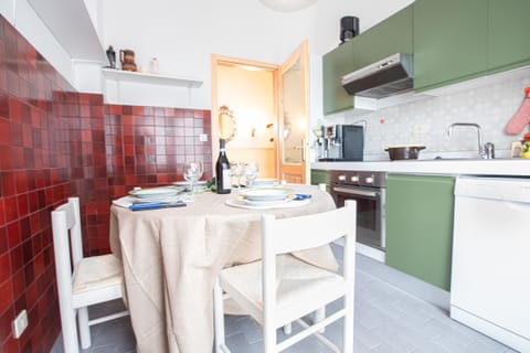 Kitchen with dishwasher, oven, fridge