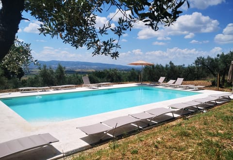 Seasonal outdoor pool, open 9:00 AM to 8:30 PM, pool umbrellas