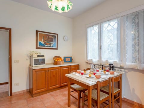 Property, Furniture, Table, Cabinetry, Window, Picture Frame, Wood, Interior Design, Chair, Lighting