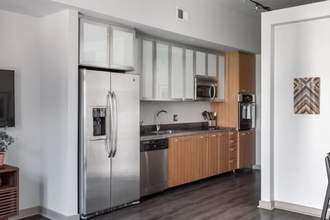 Studio, 1 Queen Bed | Private kitchen | Full-size fridge, microwave, oven, stovetop