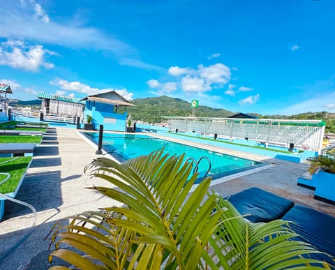 Outdoor pool, a rooftop pool, open 9:00 AM to 8:00 PM, sun loungers