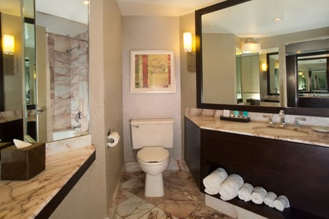 Designer toiletries, hair dryer, towels