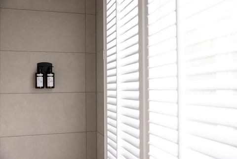 Classic Double Room | Bathroom | Shower, rainfall showerhead, eco-friendly toiletries, towels