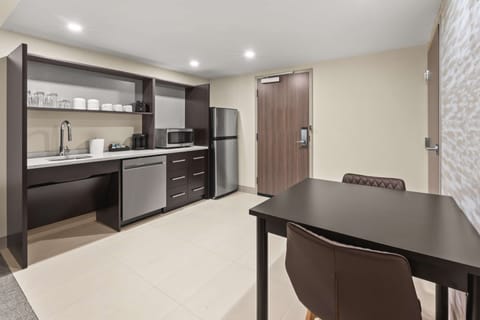 Suite, 1 Bedroom, Non Smoking | Private kitchen | Full-size fridge, microwave, dishwasher, coffee/tea maker