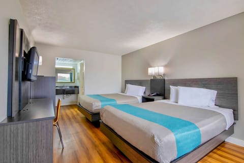 Deluxe Room, 2 Queen Beds, Non Smoking, Refrigerator & Microwave | Desk, free WiFi, bed sheets