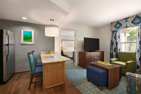 Suite, 1 King Bed, Pool View | 1 bedroom, pillowtop beds, desk, laptop workspace