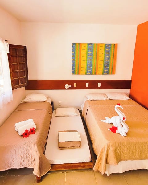 Standard Quadruple Room | Minibar, in-room safe, free cribs/infant beds, free WiFi