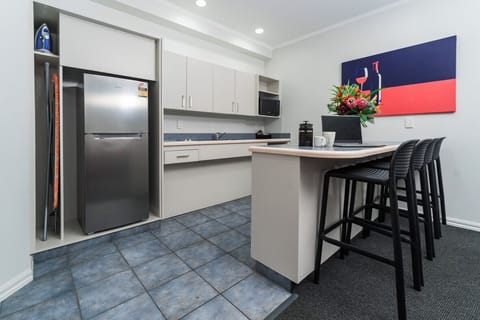 2 Bedrooms Family Suite with Walk-In Shower (Downstairs) | Private kitchen | Fridge, microwave, stovetop, coffee/tea maker