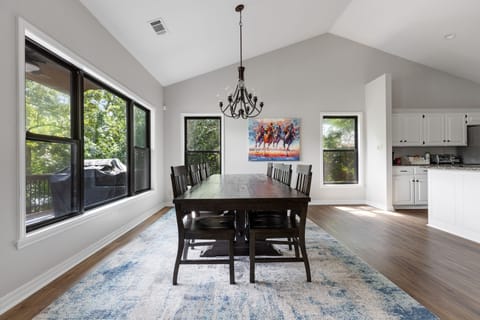 Dining area (seats up to 8) flows into kitchen.