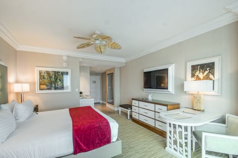 Deluxe Room, 1 King Bed | Living area | 42-inch flat-screen TV with satellite channels, TV, iPod dock