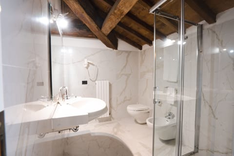 Free toiletries, hair dryer, slippers, bidet