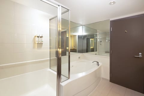 Suite, 1 King Bed with Sofa bed | Bathroom | Combined shower/tub, eco-friendly toiletries, hair dryer, towels