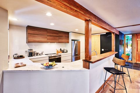 The kitchen opens up to the main space. Great for socializing. 